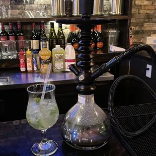 a hookah and a drink