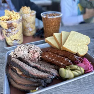 1 lb brisket, 3/4 lb pork, 2 garlic sausage, pint beans, pint tator tot, and pint corn casserole