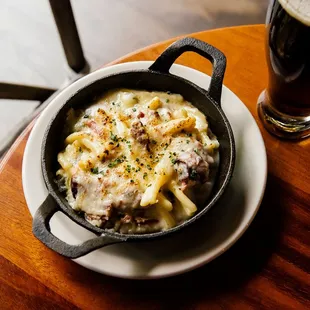 Mac and cheese with a draft beer - the perfect happy hour pairing