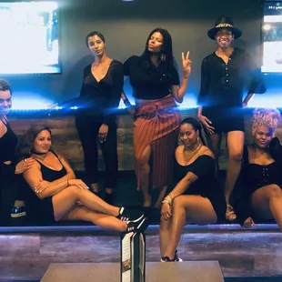 a group of women posing for a picture