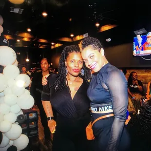 two women posing for a picture