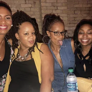 a group of women posing for a picture