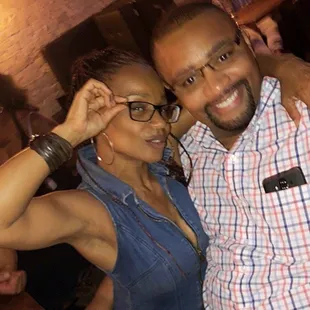 a man and a woman posing for a picture