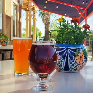 a glass of beer and a glass of beer