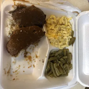 Piece of rice and meat loaf. Mac and no cheese