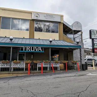 Outside. Storefront. Covered patio.