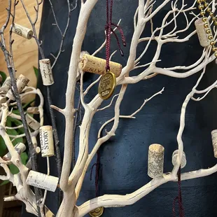 a wine cork tree in a vase