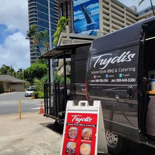 a food truck parked in front of a building