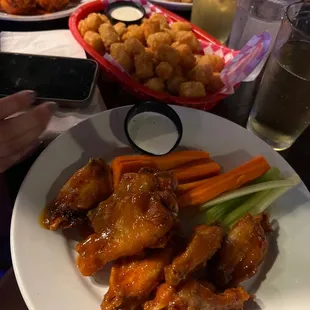 Mango habanero trad wings and tots!