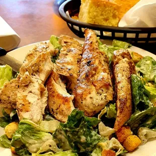 Caesar salad with grilled chicken strips, $7.25