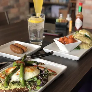 Avocado toast with chicken sausage and tryst benedict. Mimosa included!