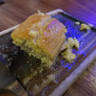 Cornbread, comes out piping hot drizzled with just the right amount of honey and butter