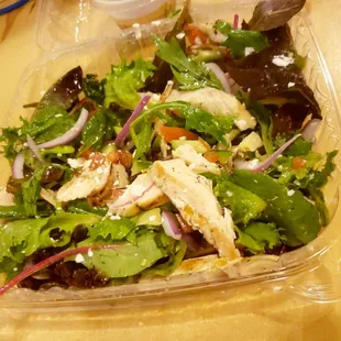 to-go greek salad with grilled chicken