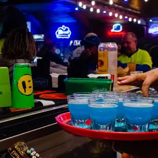 a woman serving drinks