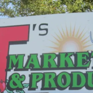 a sign for a farmers market