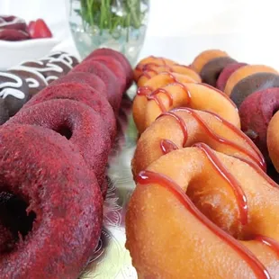 Vanilla and Red-Velvet Flavored Mini Cake donuts...with a delicious Raspberry topping