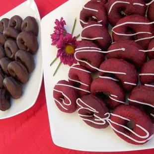 Red-Velvet with Choclate flavored mini donuts in the background
