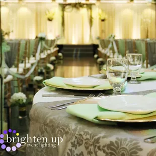 Ceremony Site at Galleria with soft gold uplighting by Brighten Up Lighting www.brightenuplighting.com