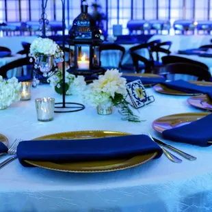 Tsakopoulos Library Galleria Decor + Catering by Griseldas Catering  Blue Uplighting | Brighten Up Event Lighting
