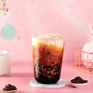 a cold drink in a tall glass