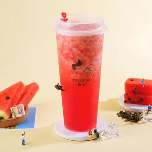 a watermelon drink and a slice of watermelon