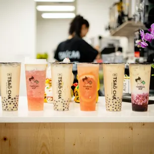 a variety of drinks on a counter