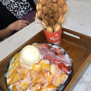 Triple fruit shaved ice (strawberry, mango, and peach) and chocolate egg waffle