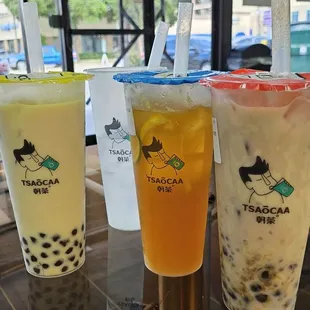 Our drinks! Starting from left to right: jasmine milk tea, water cup, passionfruit lime green tea, and taro lava sago bubble tea.