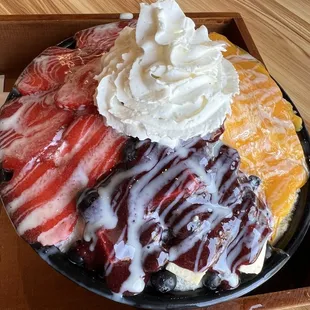 signature triple deluxe strawberry, mango and blueberry cheesecake snowflake