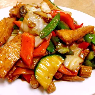 a plate of stir fried vegetables