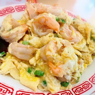 a plate of shrimp and rice