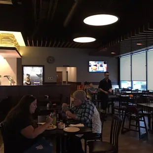 people eating and drinking
