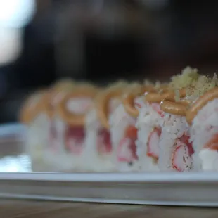 a closeup of a piece of sushi