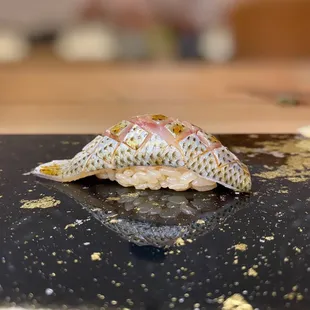 a piece of fish on a table