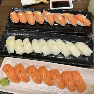 Salmon sushi, squid sushi, and smoked salmon sushi