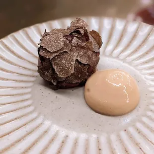 a plate of food with a dessert on it