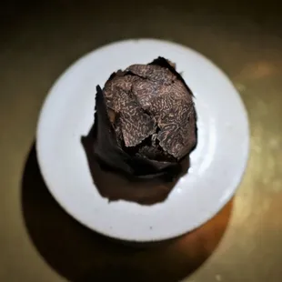 a piece of chocolate cake on a plate