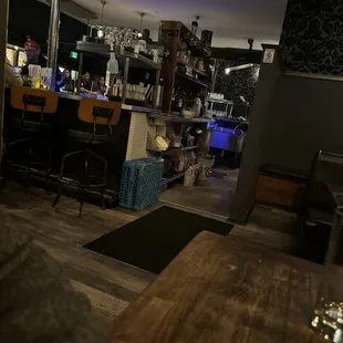 a view of a living room and kitchen