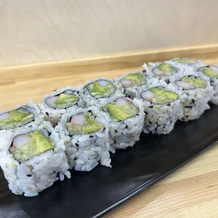 a sushi roll with avocado