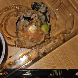 a sushi and chopsticks