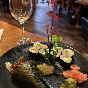 Salmon skin hand roll and Philadelphia roll