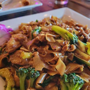 a plate of stir fried noodles