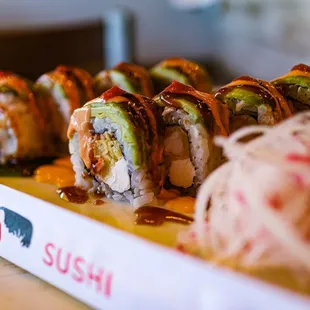 Avocado, cream cheese, and eel sauce textures