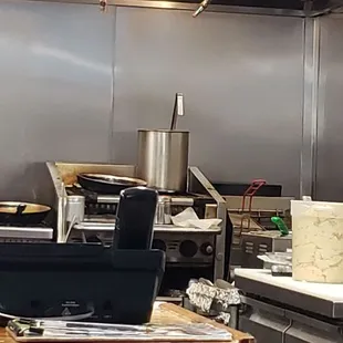 The char grill in the tiny kitchen