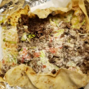 The steak burrito has plenty of steak and no filler rice, nice