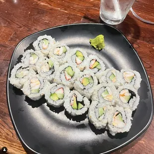 a plate of sushi on a table