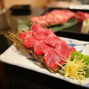 a variety of meats on a plate