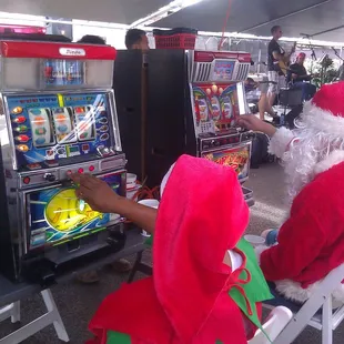 Santa and his helper having fun before his big trip