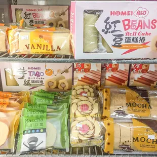 Japanese roll cakes galore!  Mocha flavor, red beans, taro, matcha, and vanilla cakes and more!