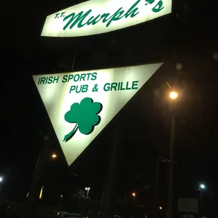 a neon sign for a pub